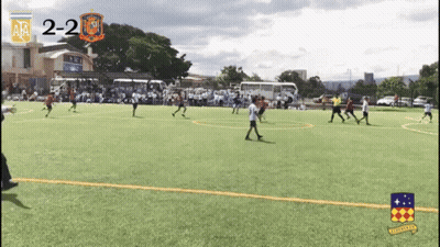 Soccer Players Score 2-2 GIF