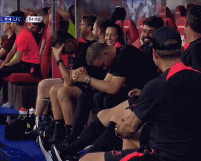 Soccer Players Sitting In Locker Room With 84 05 Sign GIF
