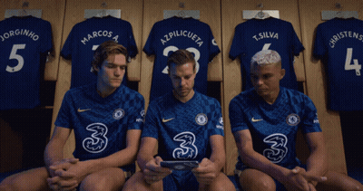 Soccer Players Sitting Locker Room GIF