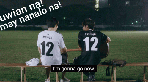 Soccer Players Sitting On Bench GIF
