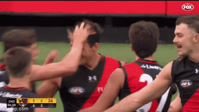 Soccer Players Standing On Field GIF