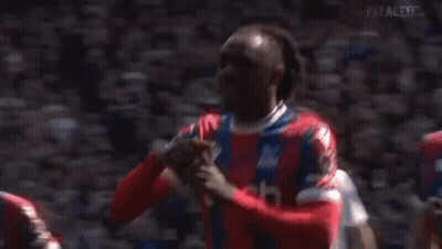Soccer Players Standing On Field GIF