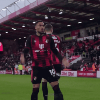 Soccer Players Standing On Field GIF