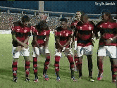 Soccer Players Standing With Hands On Hips GIF