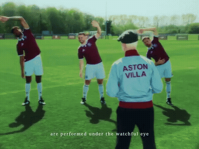 Soccer Players Stretching With Man In Aston Villa Jacket GIF