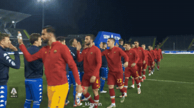 Soccer Players Walking On Field With Serie A Sign GIF