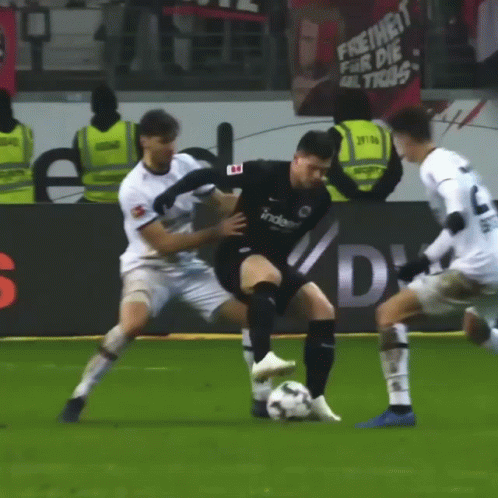 Soccer Players With Freiheit Sign GIF