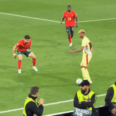Soccer Players With Man In Yellow Vest Ward K9 GIF