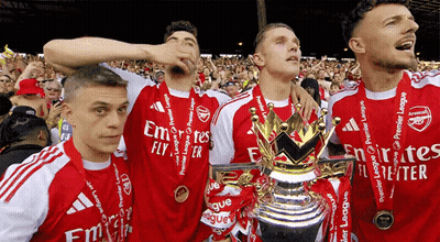 Soccer Players With Trophy And Emirates Fly Medals GIF