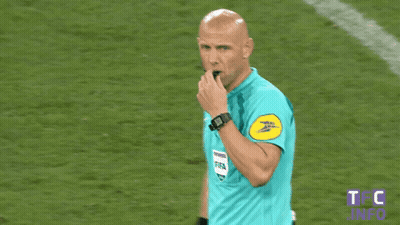 Soccer Referee In Blue Shirt With TFC Info Badge GIF