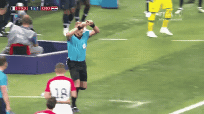 Soccer Referee In Sunglasses And Number 18 Shirt GIF