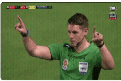 Soccer Referee Making Gesture With McDonald's Logo GIF