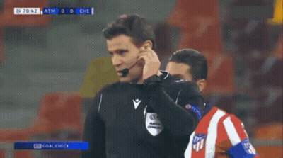 Soccer Referee Pointing at Player