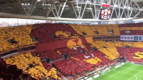 Soccer Stadium With Banner Saying He GIF