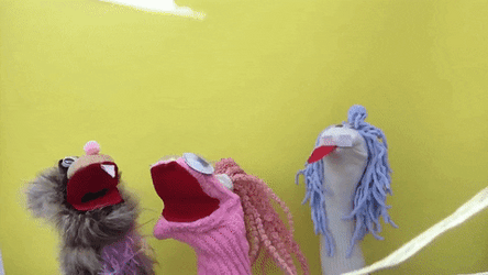 Sock Puppet Making It Rain GIF