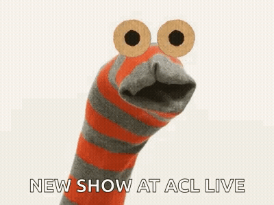Sock Puppet With Big Eyes Making Funny Face GIF