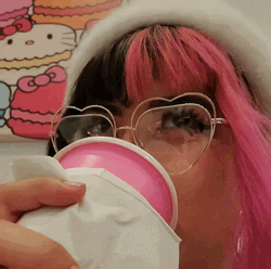 Soft Pink Hair Woman Sipping Tea GIF