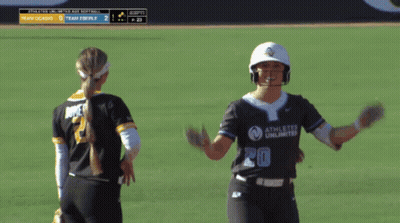 Softball Player Number 20 Celebrating With Teammate GIF