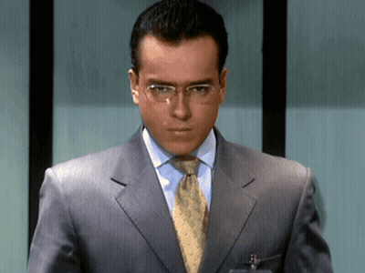 Soldier In Camouflage In Lush Green Forest GIF