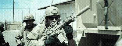 Soldier In Helmet Holding Gun GIF