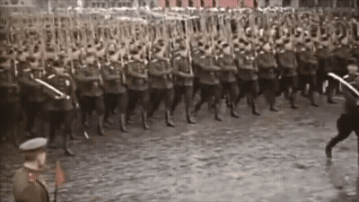 Soldier On Tank With Letter T GIF