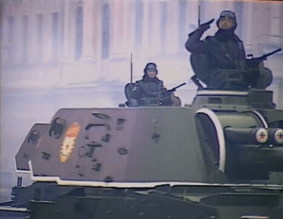 Soldier On Tank With Letter T GIF