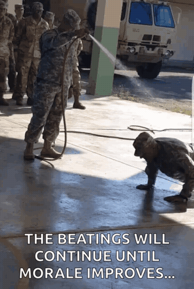 Soldier Spraying Another With Hose Saying The Beatings Will Continue Until Morale Improves GIF