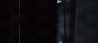 Soldier Standing In Doorway Holding Gun GIF