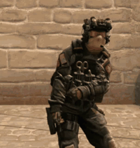 Soldier Standing In Front Of Brick Wall GIF