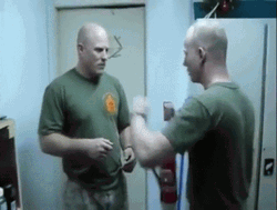 Soldier Throat Punch His Colleague GIF