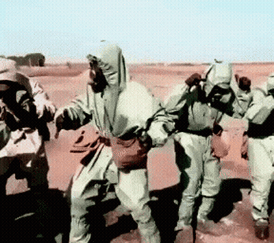 Soldiers Dancing in Desert