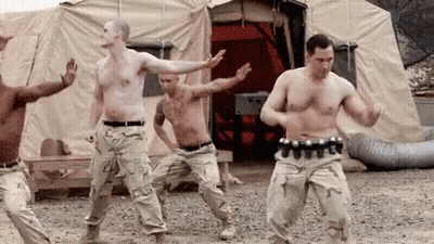 Soldiers Dancing In Front Of Tent GIF