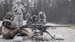Soldiers Firing The 50 Caliber Machine Gun GIF