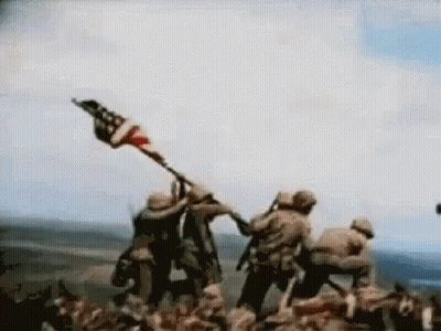 Soldiers Holding American Flag On Hill GIF