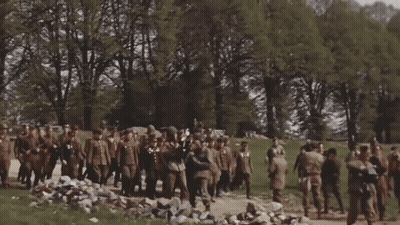 Soldiers Marching Down Dirt Road GIF