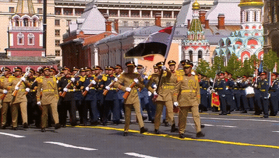 Soldiers Marching In Front Of Building Saying 100 GIF