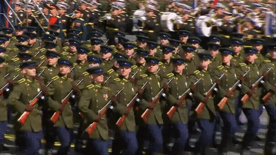 Soldiers Marching In Line With Band GIF