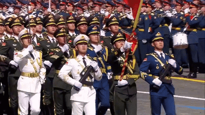 Soldiers Marching In Line With Drummer GIF