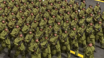 Soldiers Marching In Line With Guns GIF