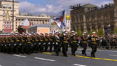 Soldiers Marching Past Building 00 GIF