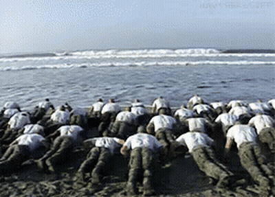 Soldiers Posing For Photo With Woman GIF