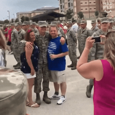 Soldiers Posing For Woman Photographer GIF