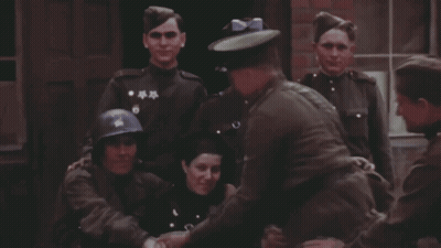 Soldiers Posing With U.S. Army Helmet