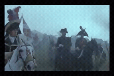 Soldiers Riding Horses In Field GIF