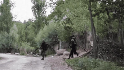 Soldiers Running Down Forest Road GIF