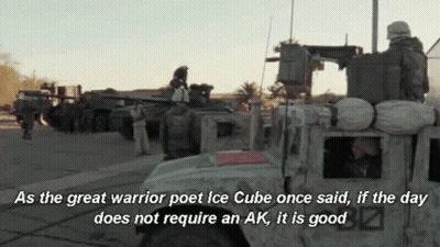 Soldiers Standing By Military Vehicle With Quote GIF