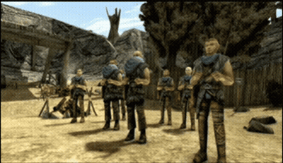 Soldiers Standing In Desert Landscape GIF