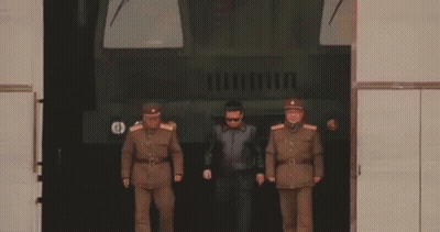 Soldiers Standing In Front Of Military Vehicle GIF
