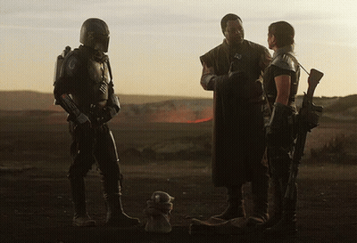 Soldiers Talking In Desert With Teddy Bear GIF
