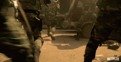 Soldiers Walking Down Dirt Road With Netflix Logo GIF